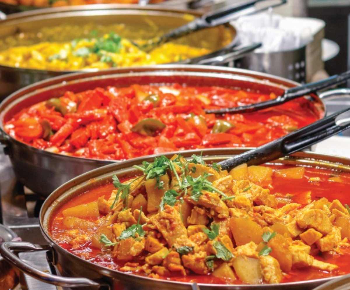 Mix of curry dishes being served