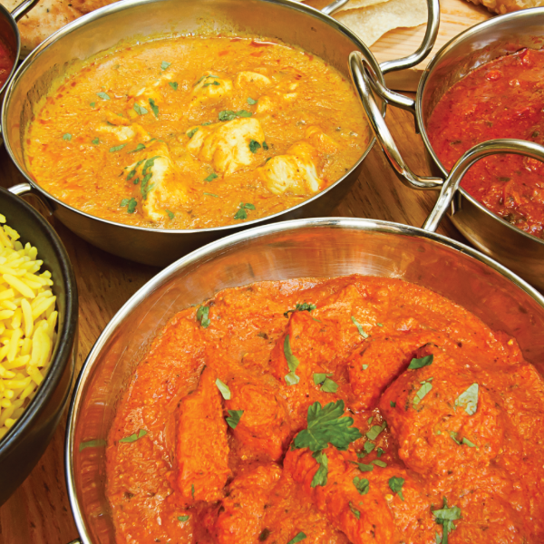 Mix of curry dishes being served