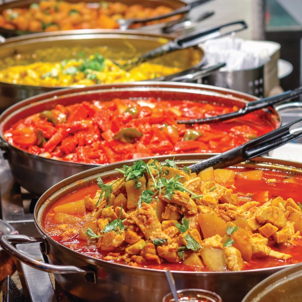 Mix of curry dishes being served